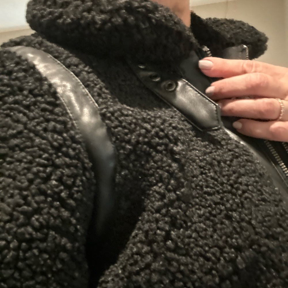 Beautiful curly Sherpa look jacket with faux leather trim